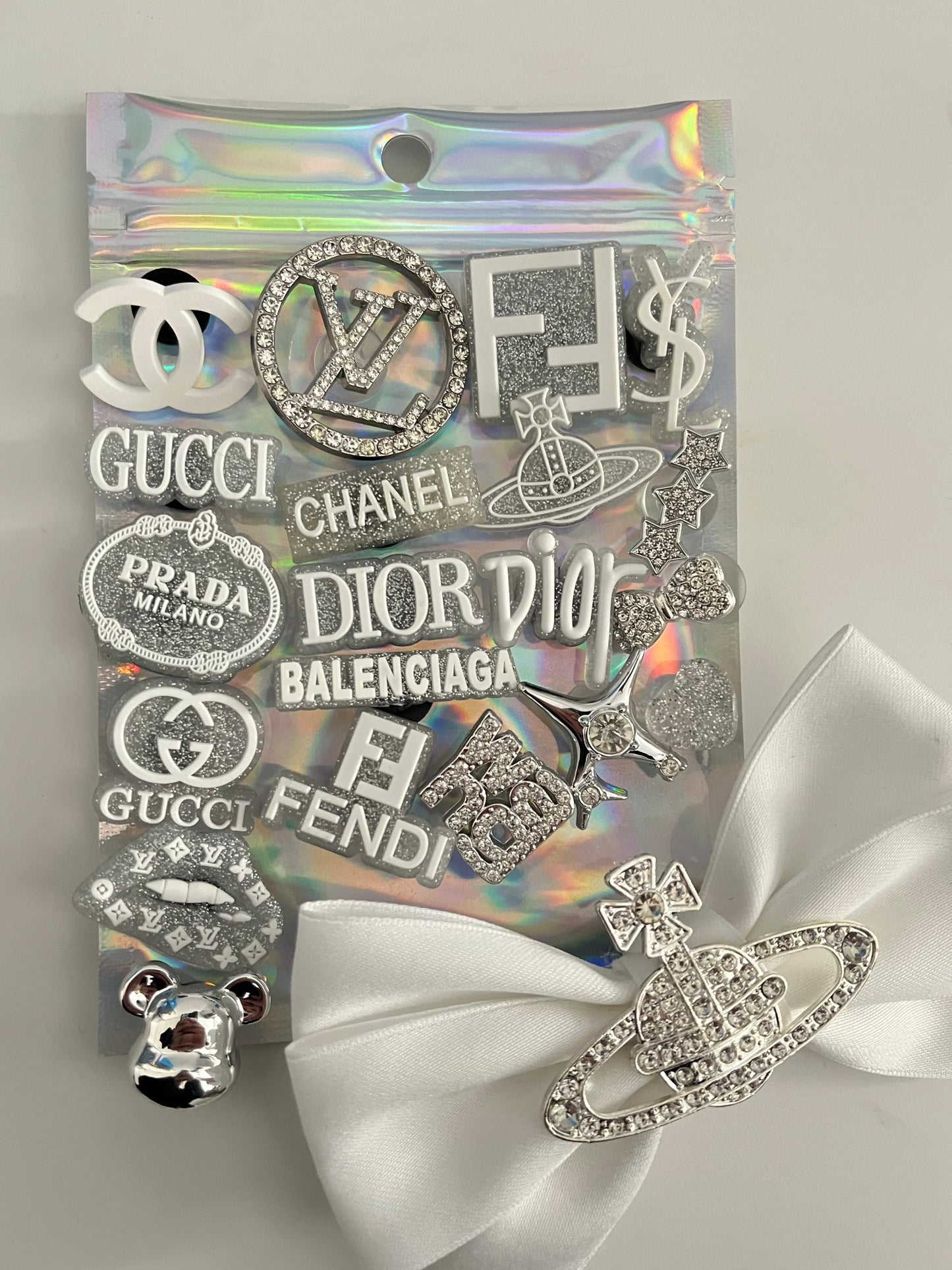 White and silver bundle with bow