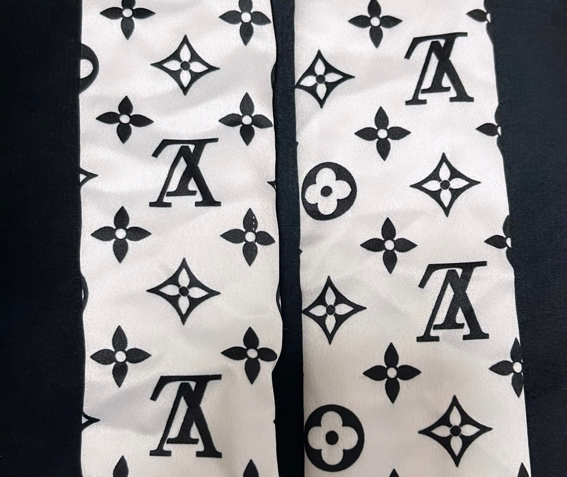 White and Black L straps