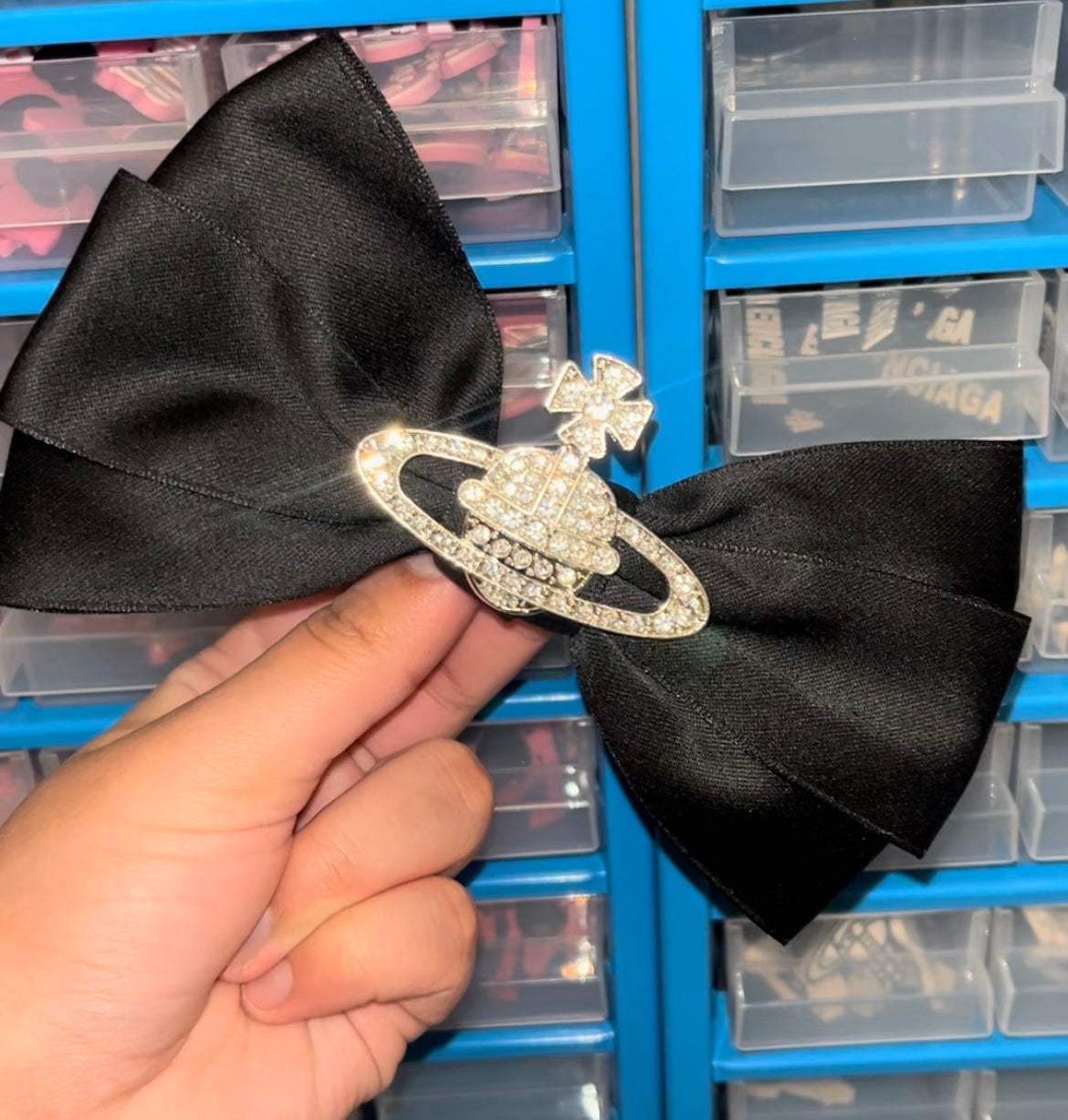 Black croc bow
