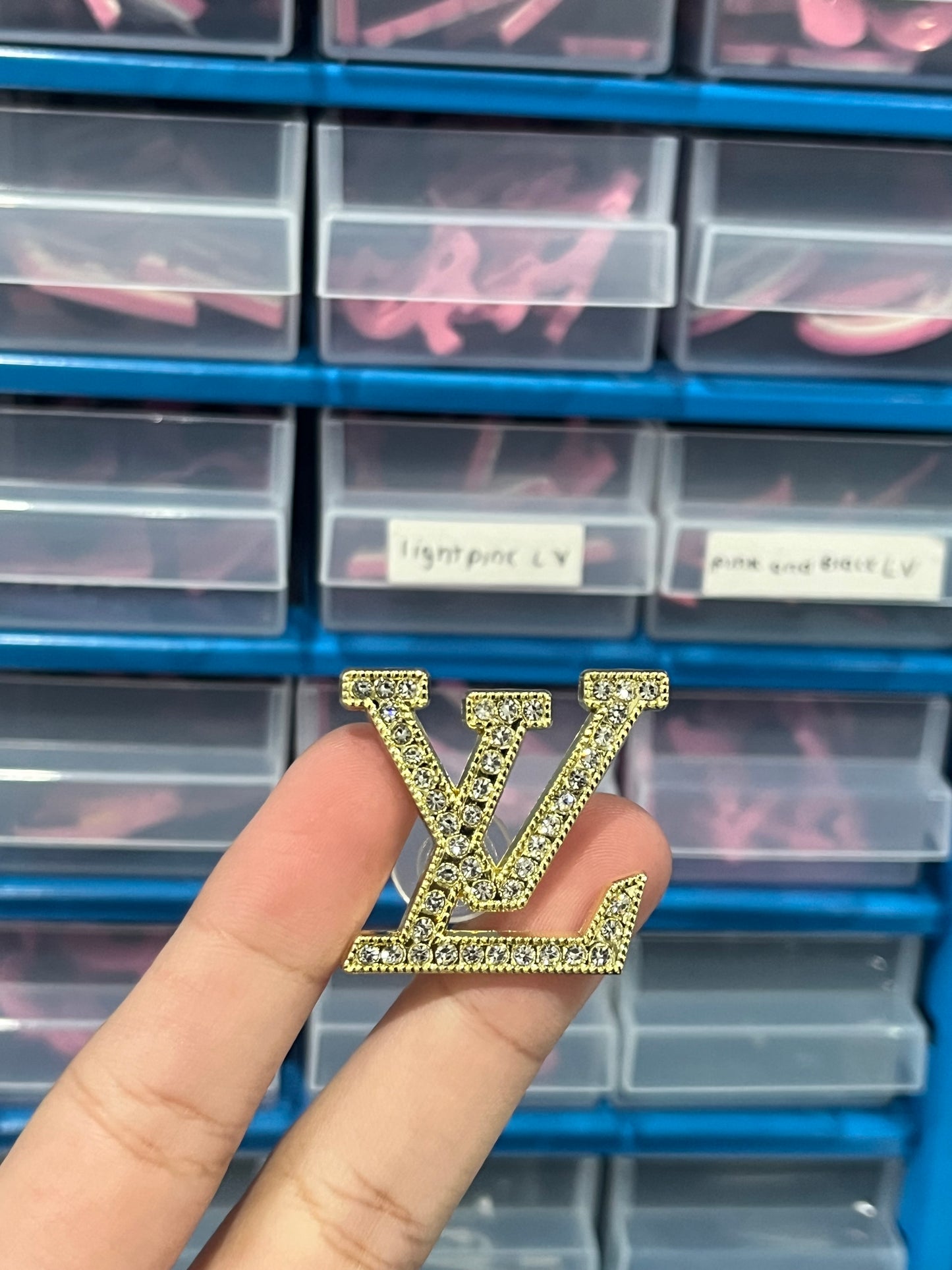 Gold L v metal charm