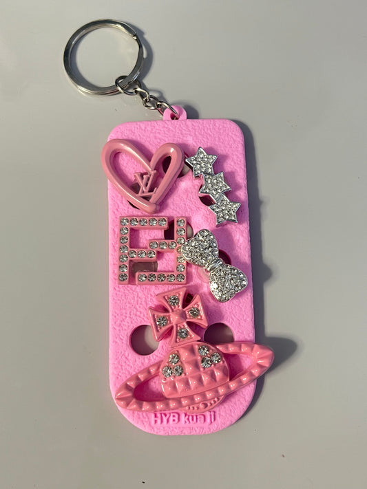 Pink keyring with charms