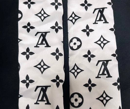 White and Black L straps
