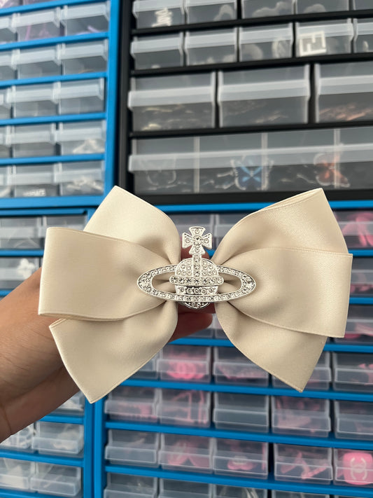 Cream planet Croc bow